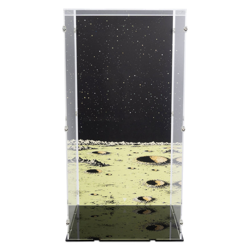 A clear acrylic display case with a printed space-themed backdrop showing a black starry sky and a cratered yellow-green lunar surface