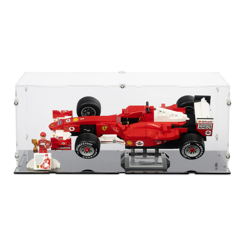 Model of a red lego Formula 1 car in a display case on a black base, clear case