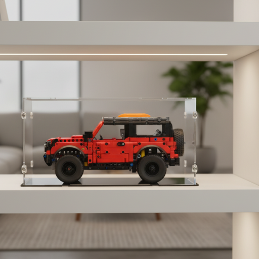 Red lego jeep model in a clear display case on a white ikea shelf