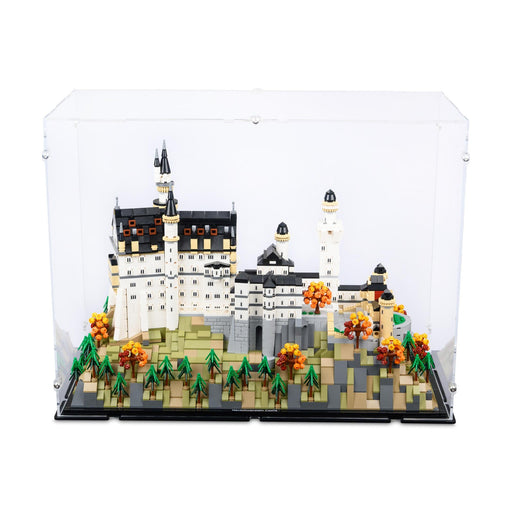 lego model of germany castle with trees and autumn leaves displayed in a clear case
