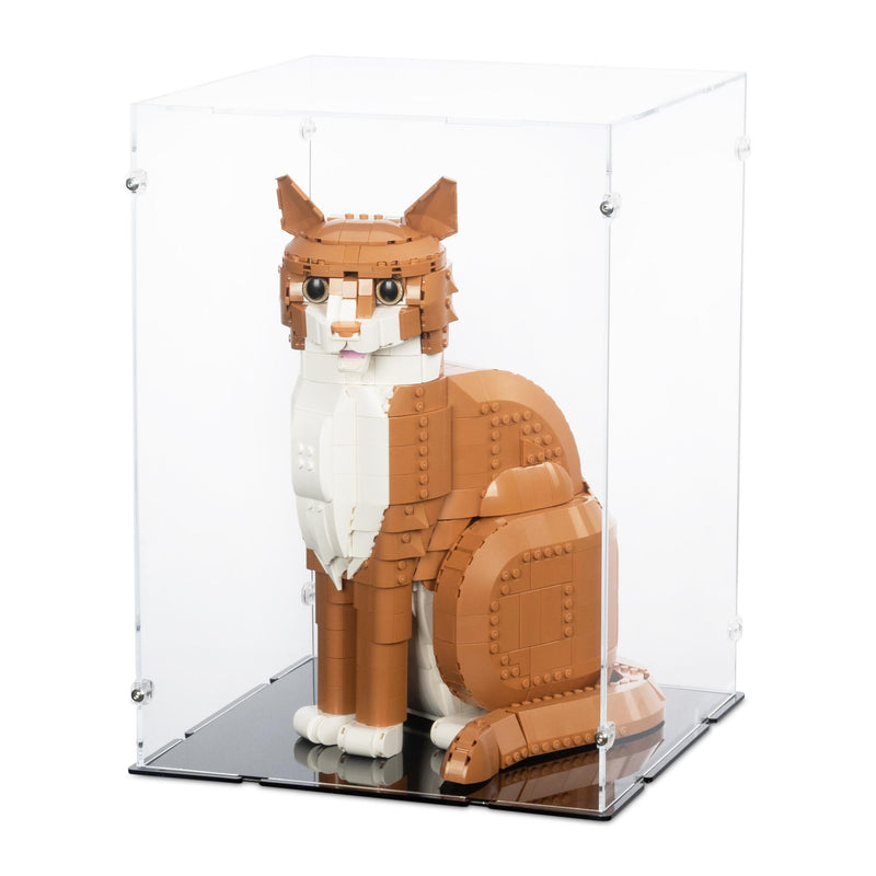 Cat-shaped LEGO block set in a clear display case on a black base