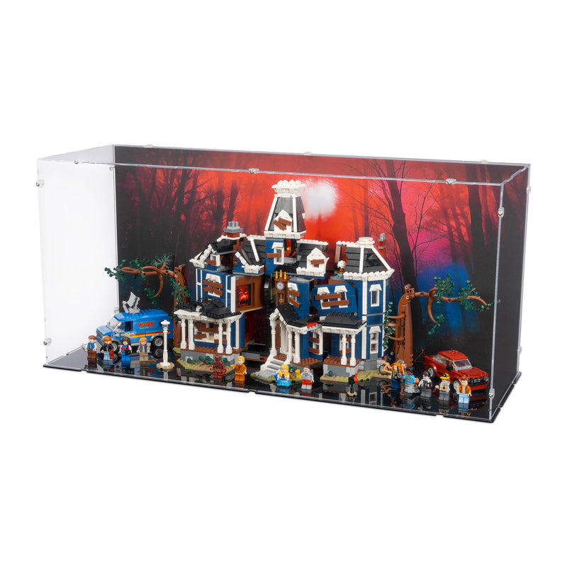 Acrylic display case with a LEGO haunted netflix house set on a white background.